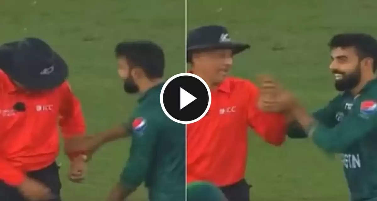 Pakistan spinner Shadab Khan tries to raise umpire's finger